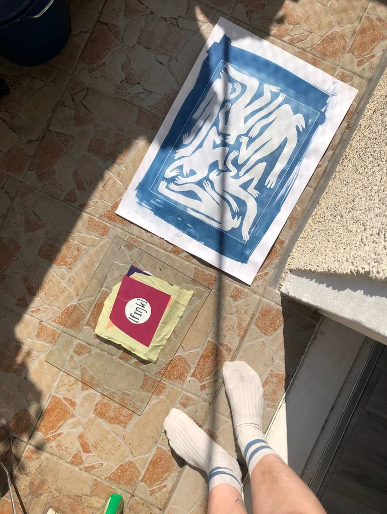 Top view of a draft of the magazine cover lying on the floor